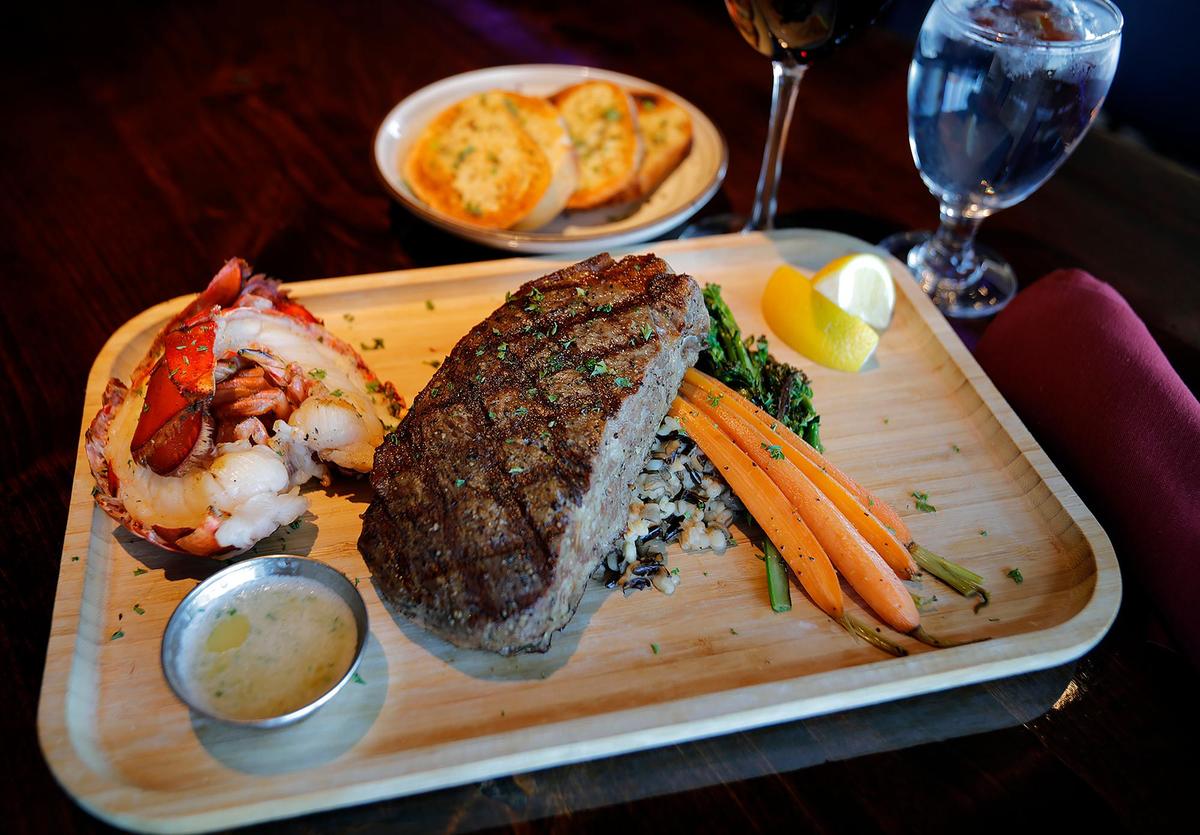 A 14-ounce New York steak and lobster tail are among the dinner options at Kicker’s in Morro Bay. The seafood restaurant opened at 850 Embarcadero on Friday, February 10, 2023.