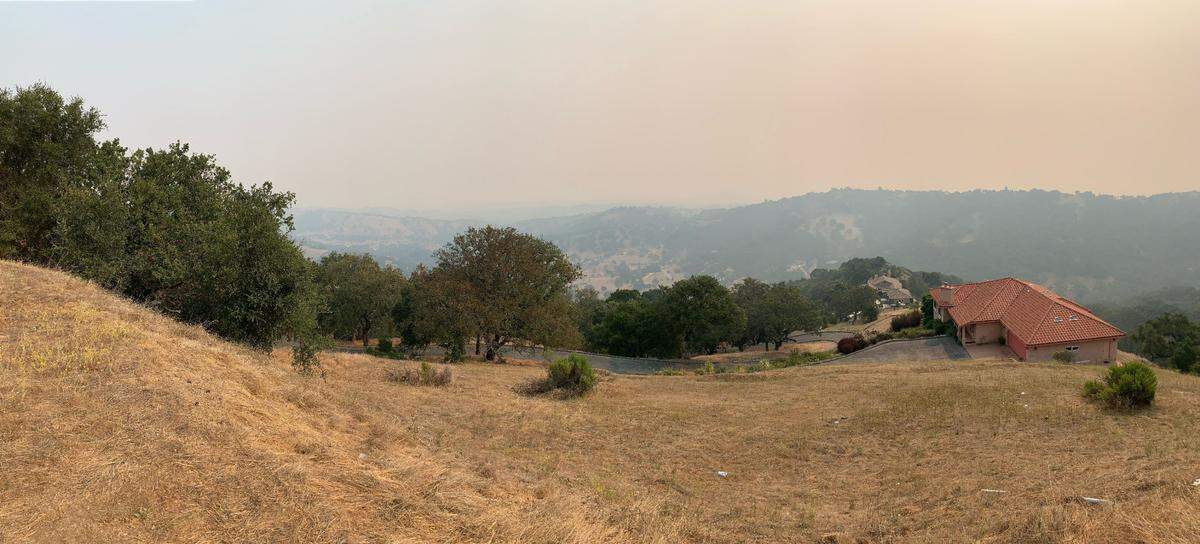 Smoke from wildfires can be seen in the sky above San Marcos Road looking toward Atascadero on Wednesday, Aug. 19, 2020.