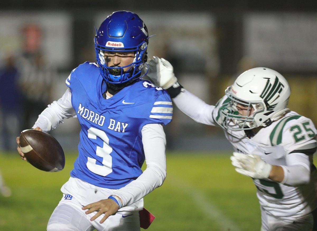 Kohen Sizemore pursues Nicky Johnson. Templeton beat Morro Bay 27-9 in a an Ocean League football game on Oct. 21, 2022.