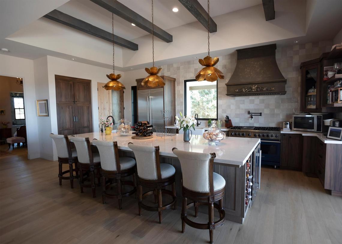 The dining room blends seamlessly with the kitchen area of the San Miguel home of Charles Miller and Tina Gulotta-Miller.