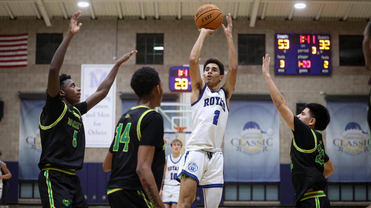 David Kellogg takes a shot surrounded by, from left, Cobi Posas, Darreon Wheaton and Adrian Flores. Mission Prep beat Roosevelt 80-52, in a boys’ playoff basketball game on Feb. 19, 2025.