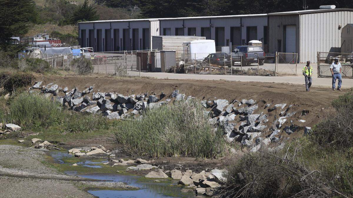 Work is being completed to repair 2023 erosion to Morro Creek on April 7, 2026.