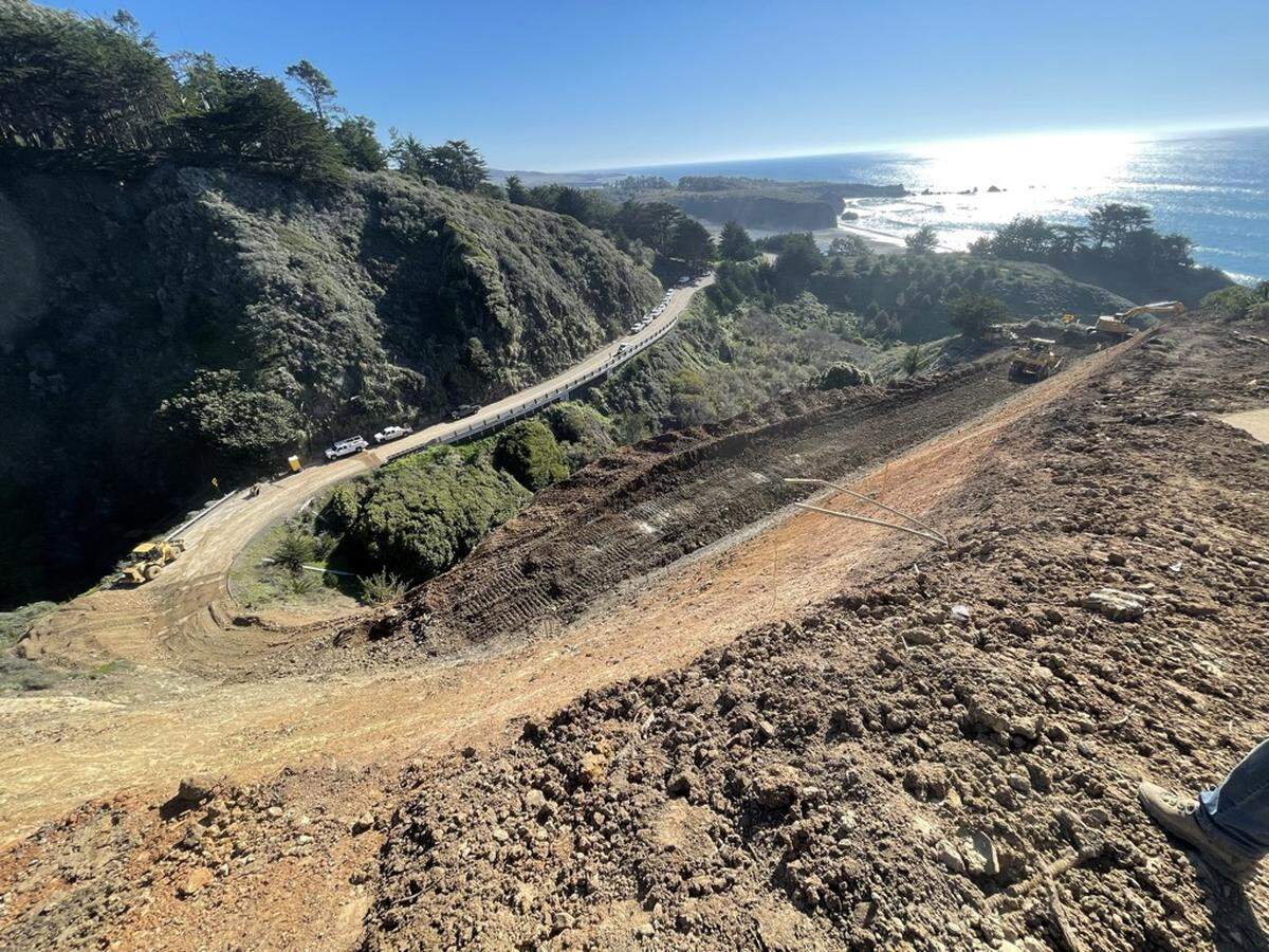 Crews work to clear Highway 1 at the Polar Star slide on Jan. 26, 2023.