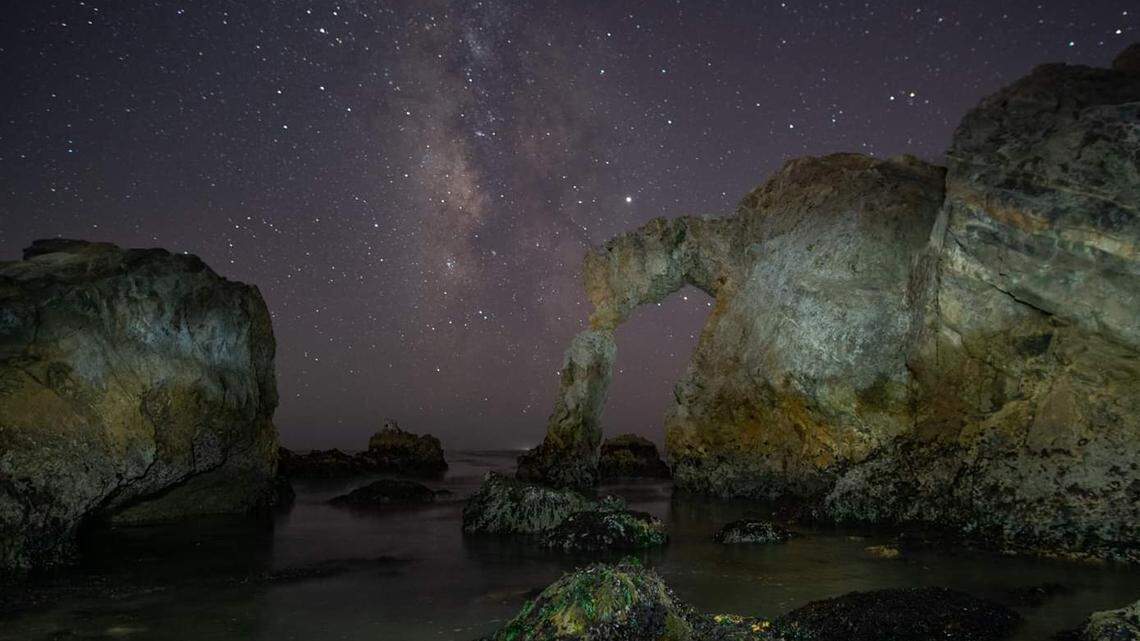 Justin Laughlin took this photo of the Milky Way galaxy behind a natural rock arch at Avila Beach at night on Sept. 30, 2019.