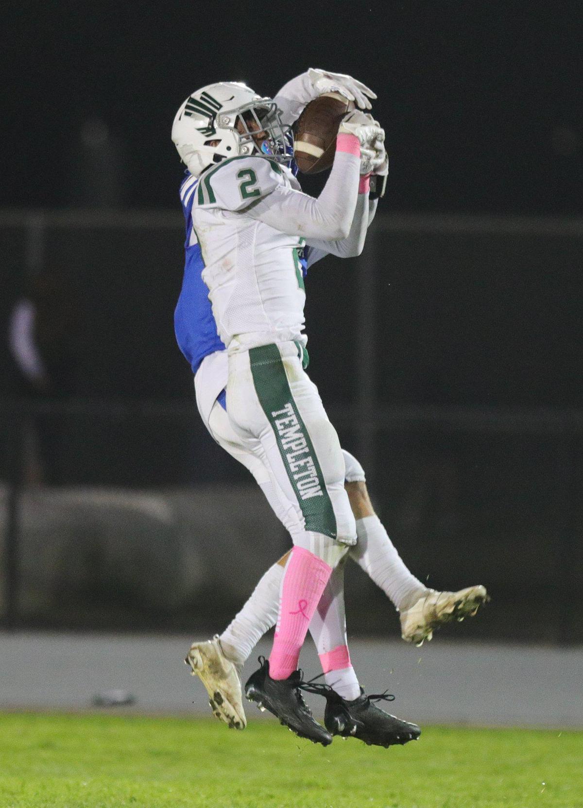 Dylan Krilling intercepts a ball intended for Caleb Calhoun. Templeton beat Morro Bay 27-9 in an Ocean League football game on Oct. 21, 2022.