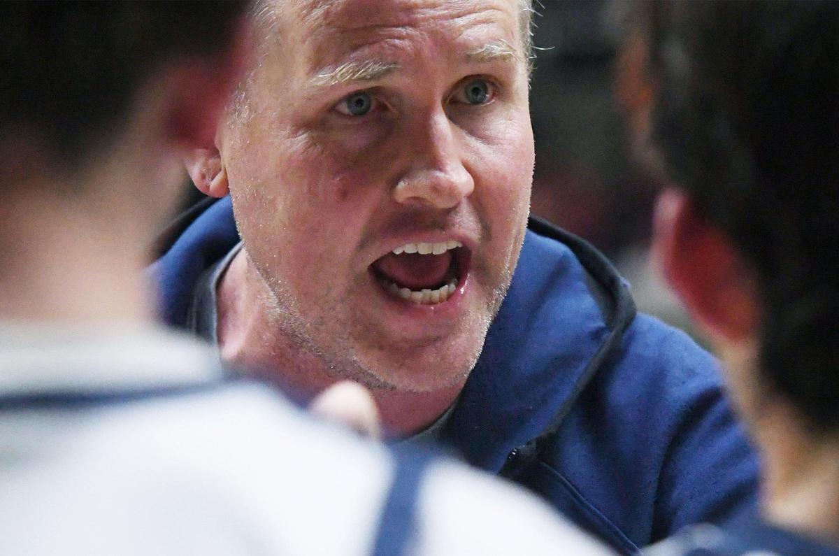 Arroyo Grande head coach Ryan Glanville talks to the team during a timeout against Porterville at the CIF Central Section basketball championships Friday, Feb. 24, 2023, in Fresno.
