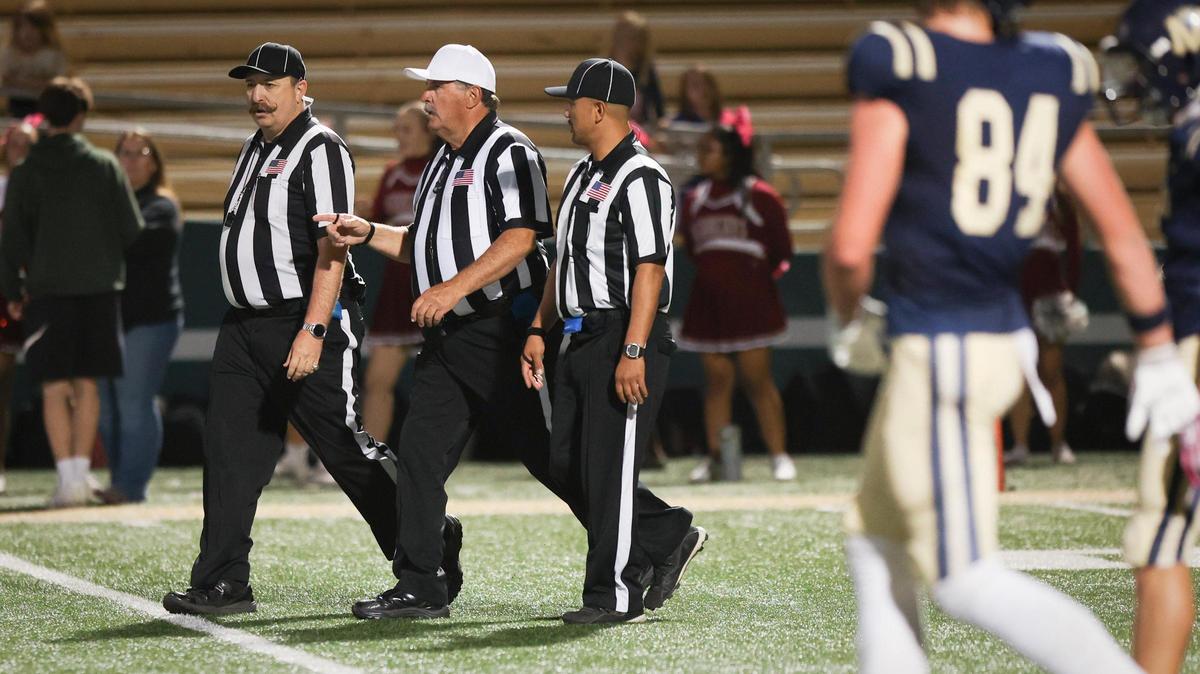From left, referees Rick Sherwood, Garold Shaffer and Manny Romero work a game between Mission Prep and Paso Robles on Oct. 25, 2024. The game was held at Cal Poly’s Mustang Memorial Field.