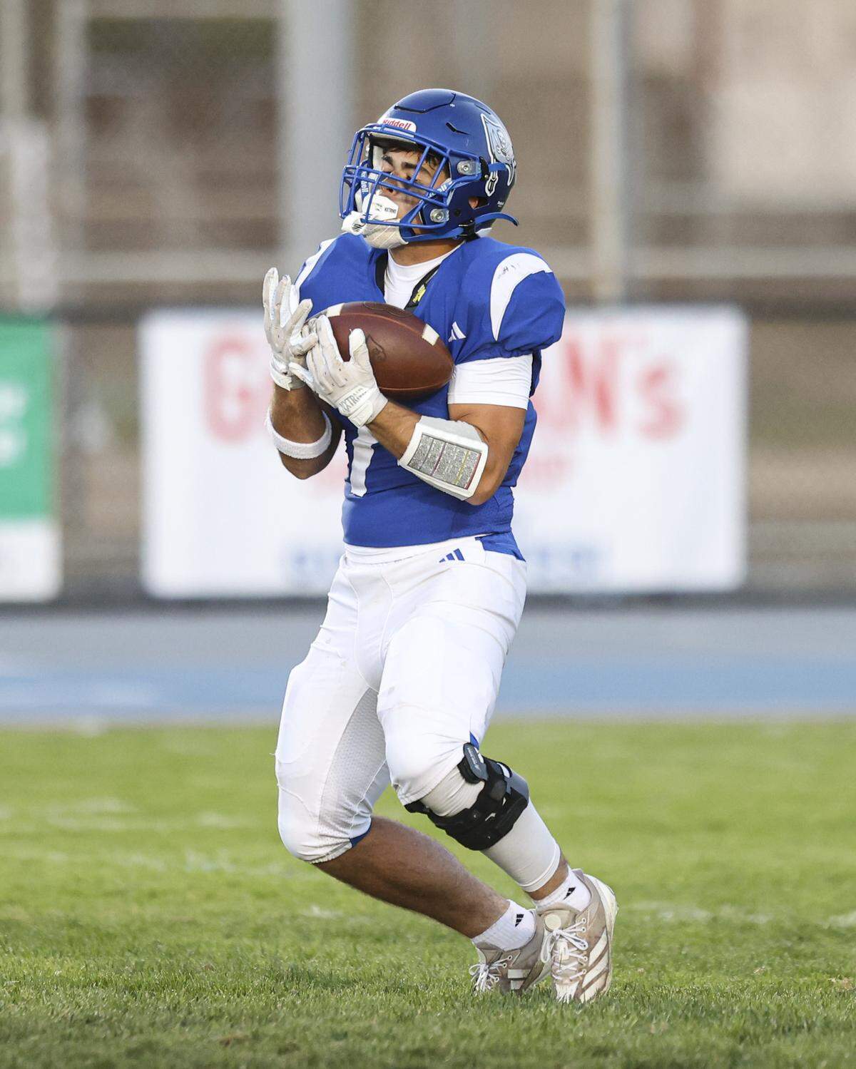 Luca Macari fields a kickoff as Morro Bay beat Lindsay 52-24 in a high school football game on Aug. 29, 2025.