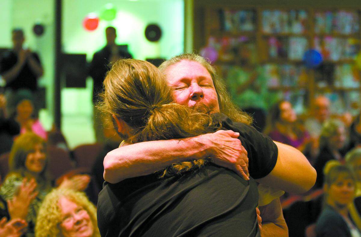 Gail Schnoor hugs her son Fritz Schnoor after he graduated from Behavioral Health Treatment Court in San Luis Obispo on June 13, 2014. who completed the program. Schnoor is accused of stabbing Joseph and Cynthia Giambalvo in their home on Sept. 19, 2025, killing Cynthia.