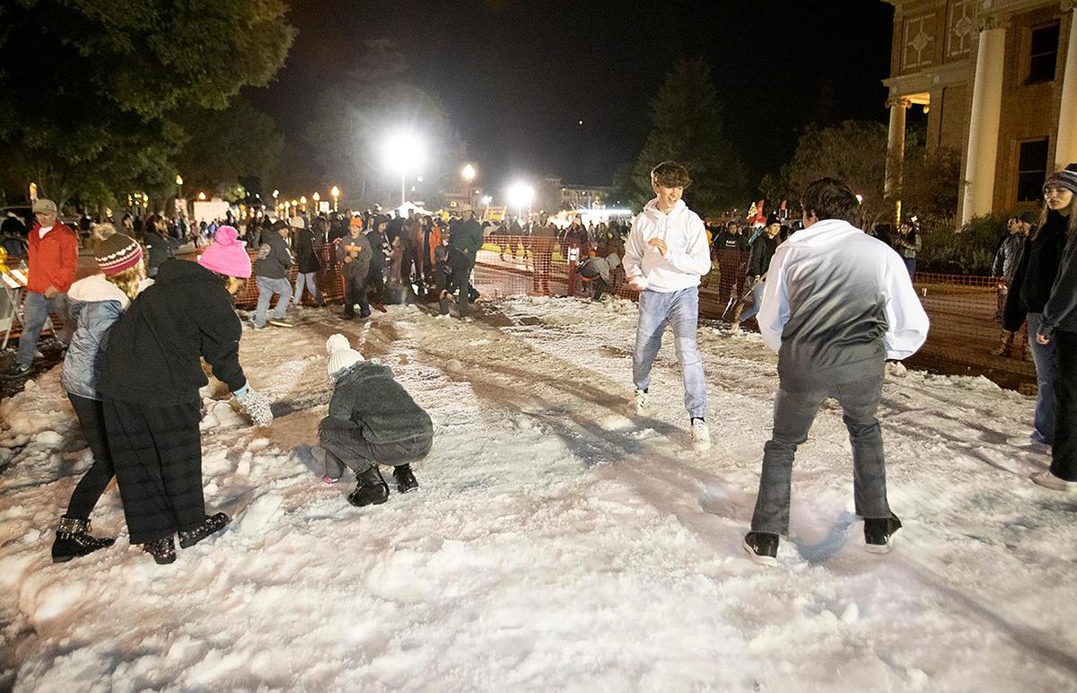 Kids young and old played in the snow. Hundreds of people showed up for the Atascadero Winter Wonderland night for snowball fights, tasty food, fun games and, of course, to visit Santa Claus.