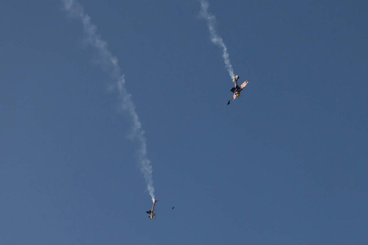 Pilots Luke Aikins and Andy Farrington exit their planes in an attempt to swap them and land both safely during a stunt in Eloy, Arizona, on April 24, 2022. One of the pilots completed the swap and landed the plane safely while the other was unable to do so and parachuted to the ground.