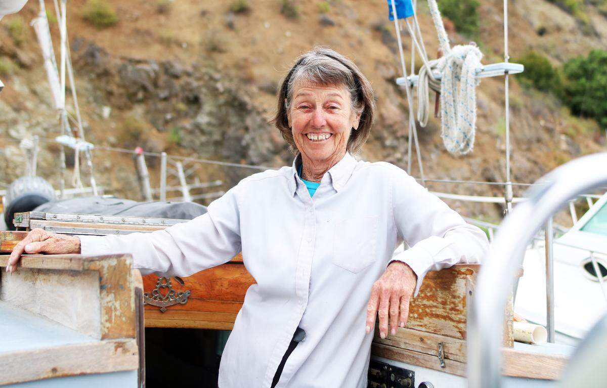 Lynn Meissen, 75, stands aboard the "Guayacan", a 43-foot sailboat that she has made her home since 1979, as it undergoes routine maintenance at the Port San Luis Harbor.