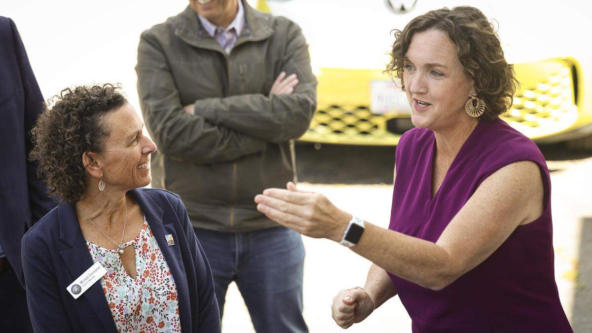 Michelle Shoresman, left, San Luis Obispo City Council listens to Katie Porter California governor candidate, before a town hall where Porter took questions from the audience in San Luis Obispo on April 3, 2026.