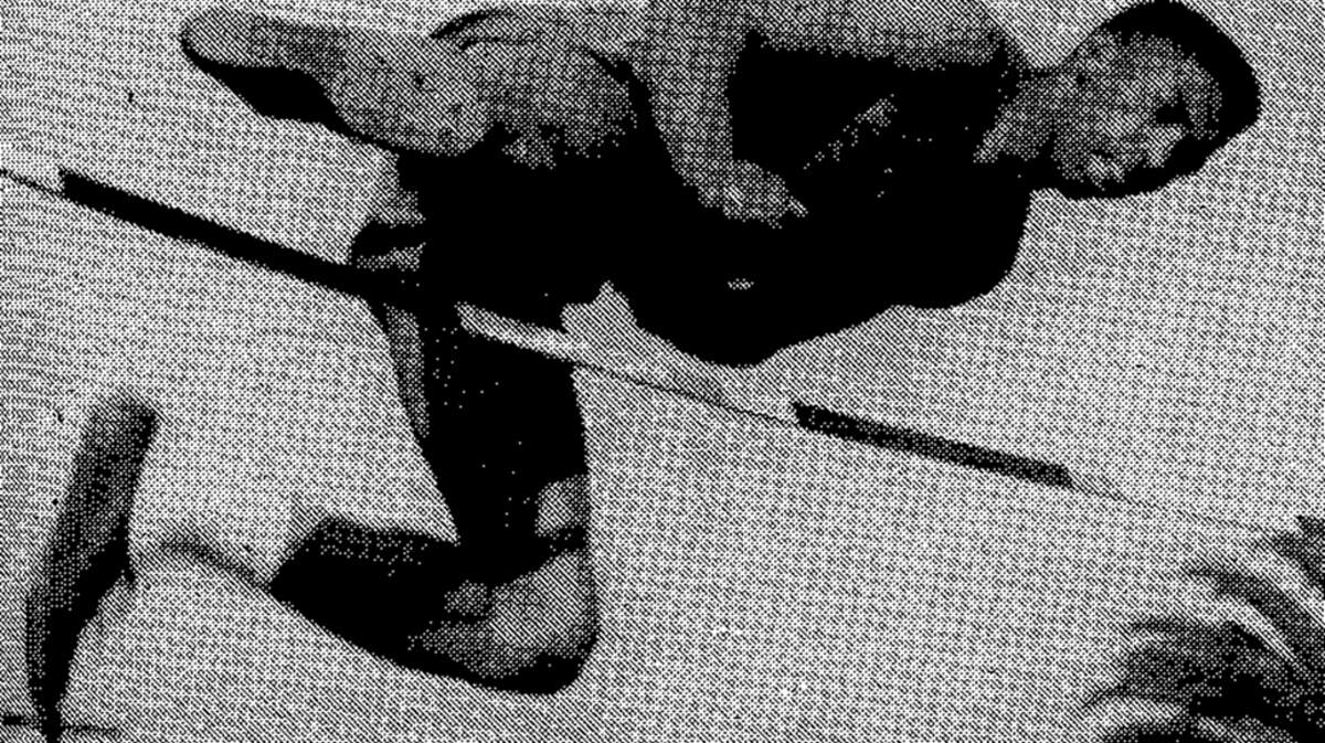 Floyd Jeter competes in the high jump at Roosevelt High School in East Los Angeles in 1952