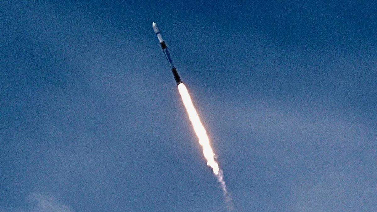A Falcon booster carrying 52 Starlink satellites launches into space Friday, March 17, 2023, from Vandenberg Space Force Base near Lompoc.