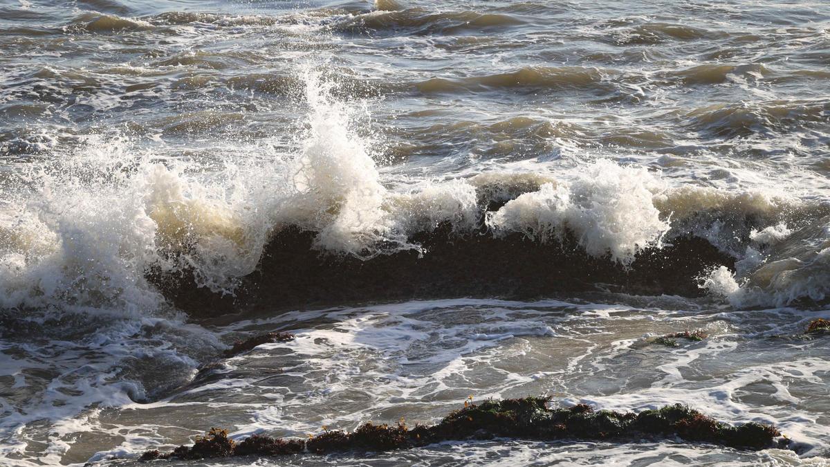 A wave crashes over rocks along the shore of Shell Beach. Storm-driven erosion in Pismo Beach has oceanfront homeowners concerned. 