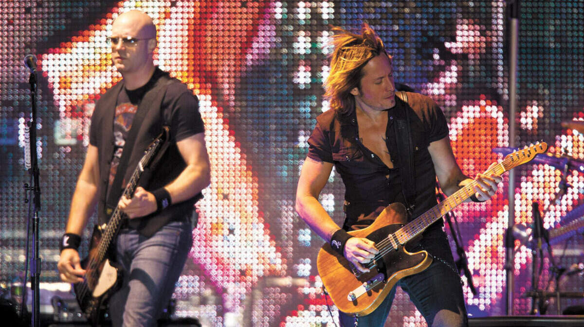 Keith Urban, right, is shown here at the fair in 2010, and he also appeared on the Main Grandstand in 2006. Before he hit it big, he played free concerts on the fair's smallest stage in 2002.