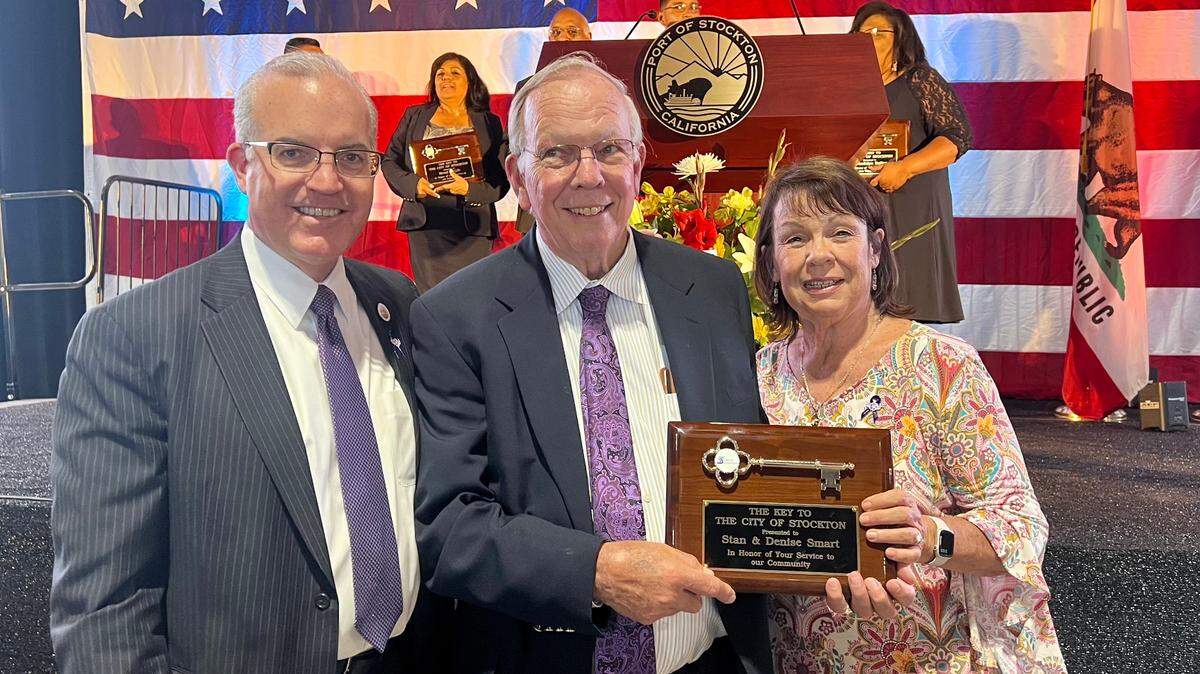 Kristin Smart’s parents Stan and Denise Smart, right, pose with the key to Stockton on May 18, 2023, after the mayor’s State of the City address in Stockton.
