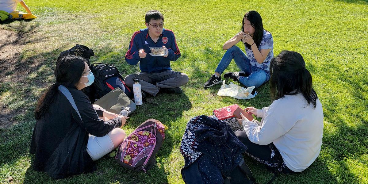 Cal Poly students enjoy lunch on a warm afternoon at Dexter Lawn.