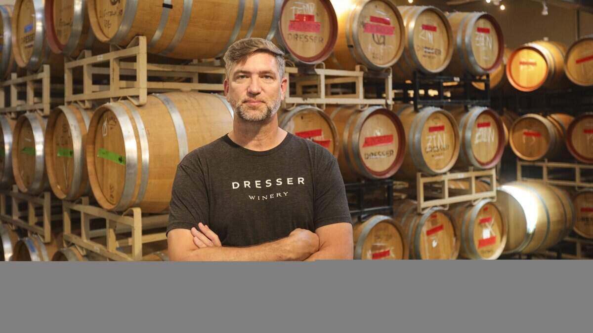 Kory Burke, owner - winemaker at Dresser Winery is processing how tarriffs will impact a business that imports equipment and barrels while it exports wine, seen here on. Aug. 28, 2025.