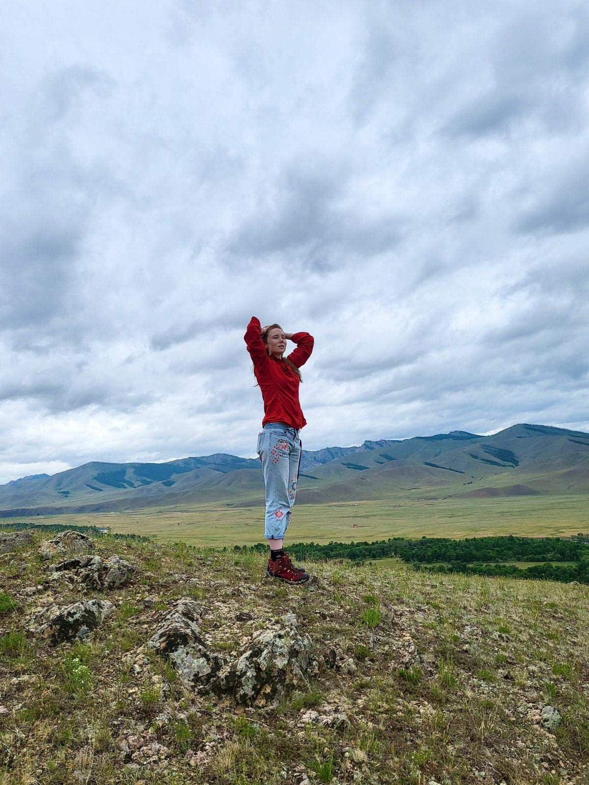 Nipomo native and Peace Corps volunteer Claire Bodger stands in the wildnerness near her home in the Arkhangai Province of Mongolia. Bodger splits her time roughly 50-50 between teaching English language classes and running an environmental education program.
