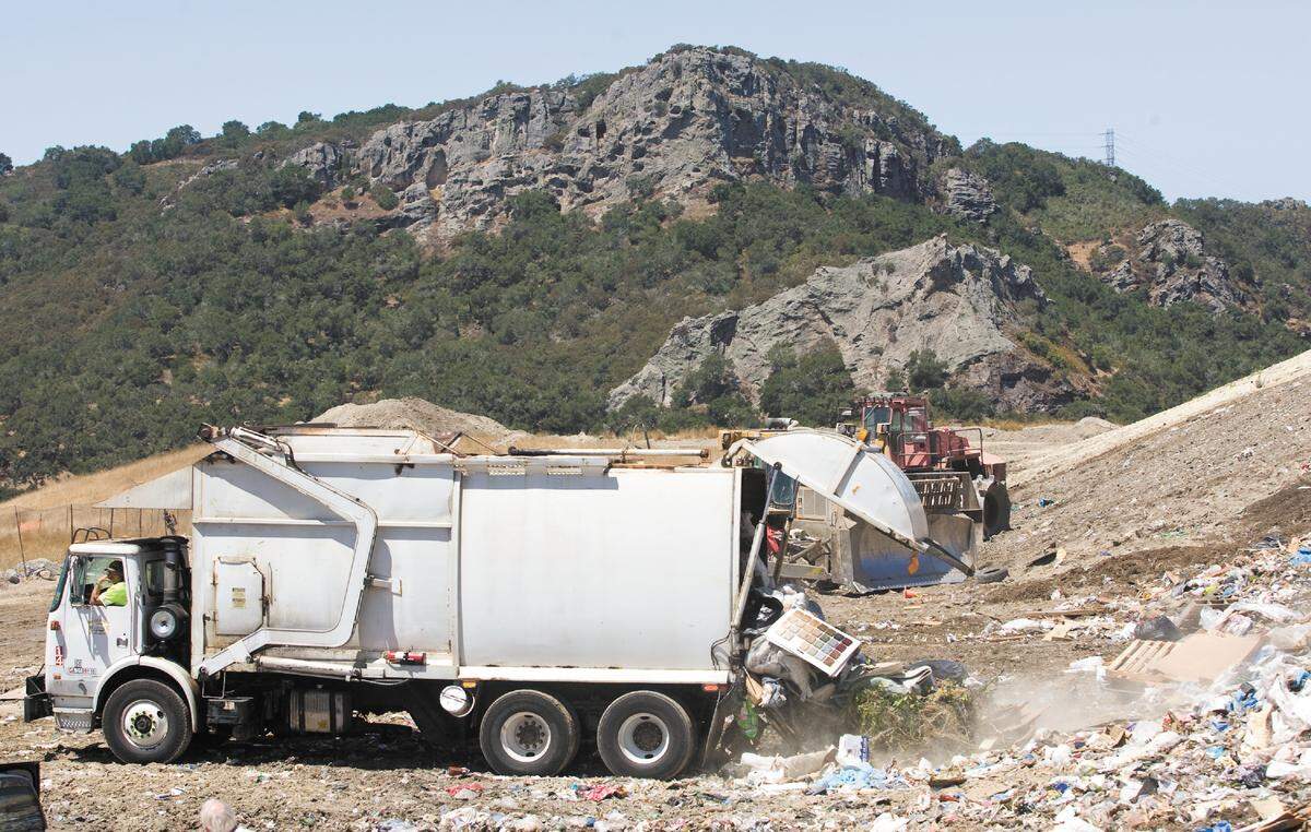 A San Luis Garbage truck drops off a load at Cold Canyon Landfill on Highway 227.