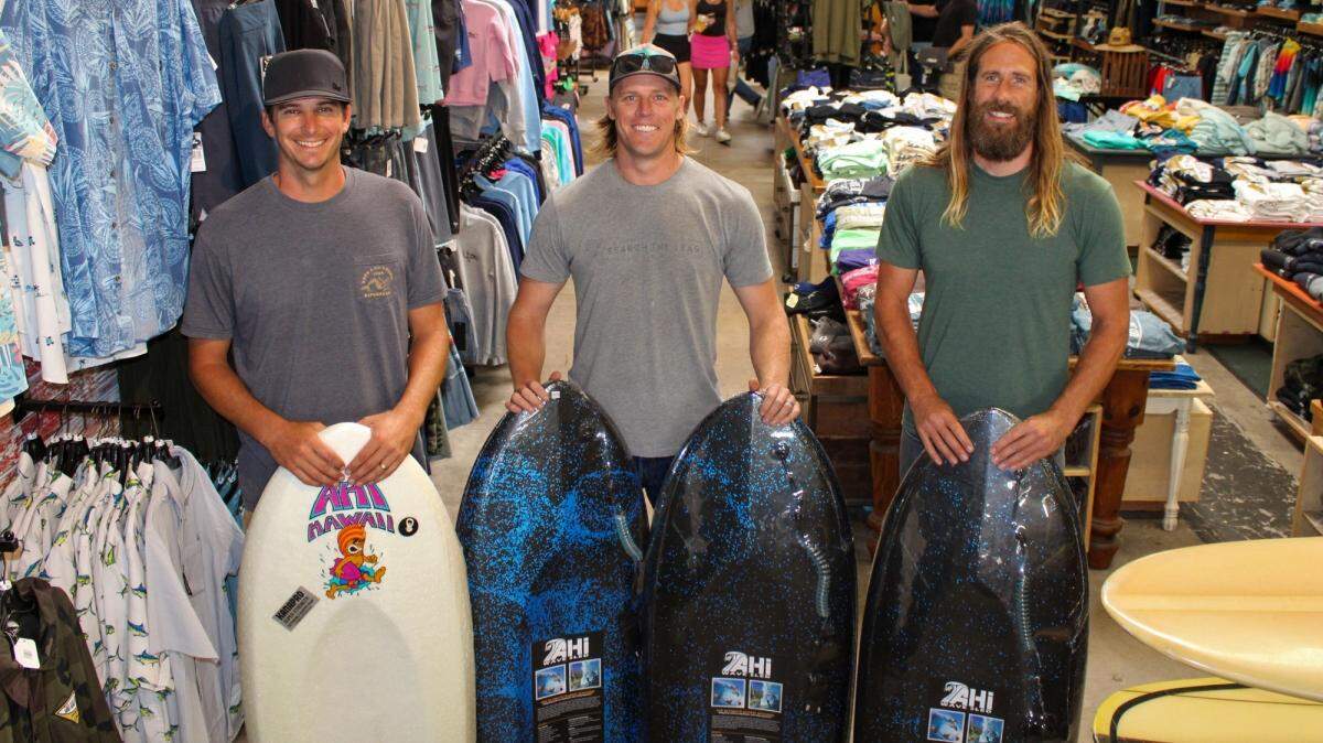 From left, Grayson Nance, Matt Van Dyk and Aaron “Johnny” Foster are part of the team relaunching the Ahi board for a new generation.