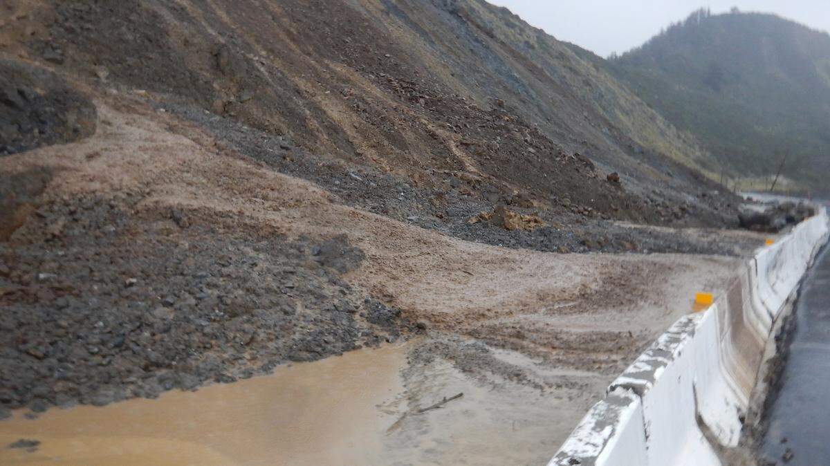 Paul’s Slide, about 21 miles north of the Monterey County line, is seen Wednesday. The slide blocked Highway 1 during rains last year and has been open to one-way, alternating traffic since mid-July.