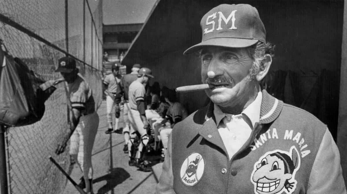 Scoop Nunes, general manager of the Santa Maria Indians semipro baseball team, watches his team from the dugout in March 1980.