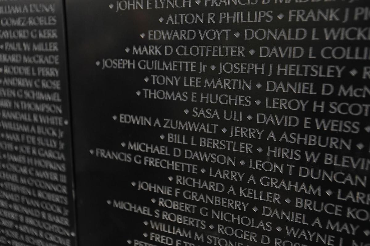 The names of American military service members killed in the Vietnam War are seen on The Wall that Heals, a three-quarter scale replica of the Vietnam Veterans Memorial in Washington, D.C. The touring memorial visited San Luis Obispo in March 2023.