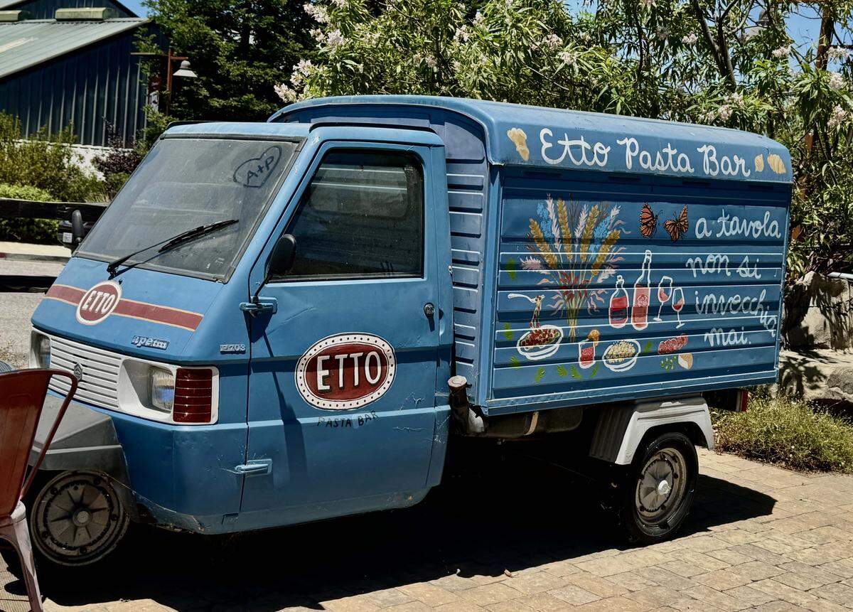 An attention-getting European delivery truck resides outside the Etto Pasta Bar in the nearby Tin City makers market area of Paso Robles.