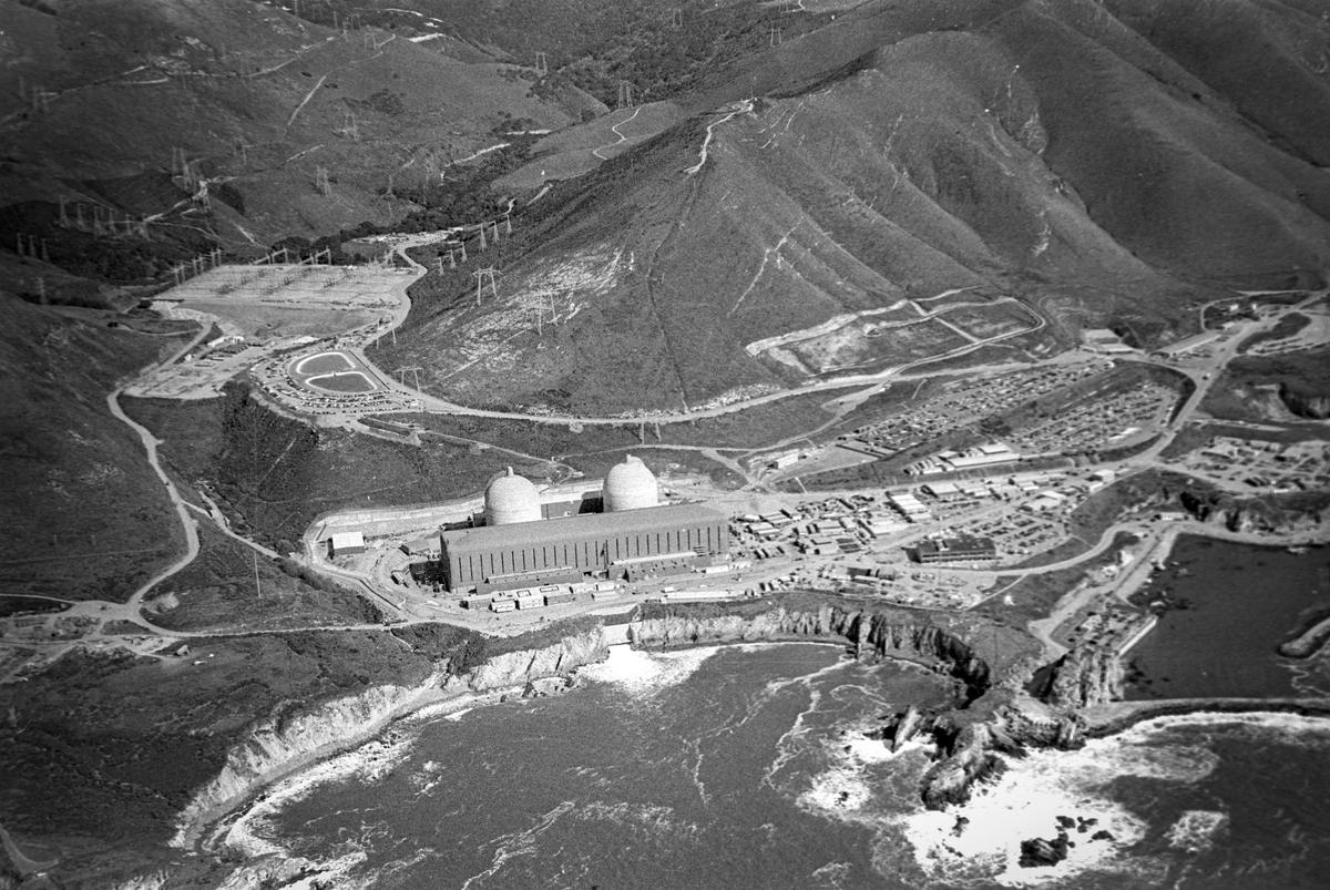 Aerial of Diablo Canyon nuclear power plant which was undergoing testing roughly a year before starting operations with Unit 1 May 7, 1985. Many buildings would later be added to the site around the plant. Reporter Brooks Townes took a flight over coastal areas from Morro Bay to Avila Beach on Feb. 22, 1984.