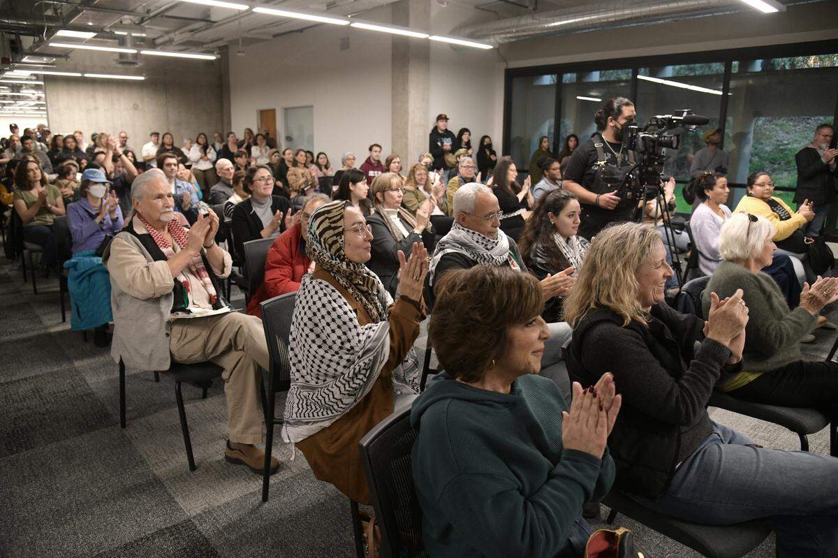 People attend the opening event for the Mawtini installation at Cal Poly’s Kennedy Library, which honors the oral histories of Arab Americans in SLO. It officially launched on Jan. 24, 2026, and will remain through March 20.