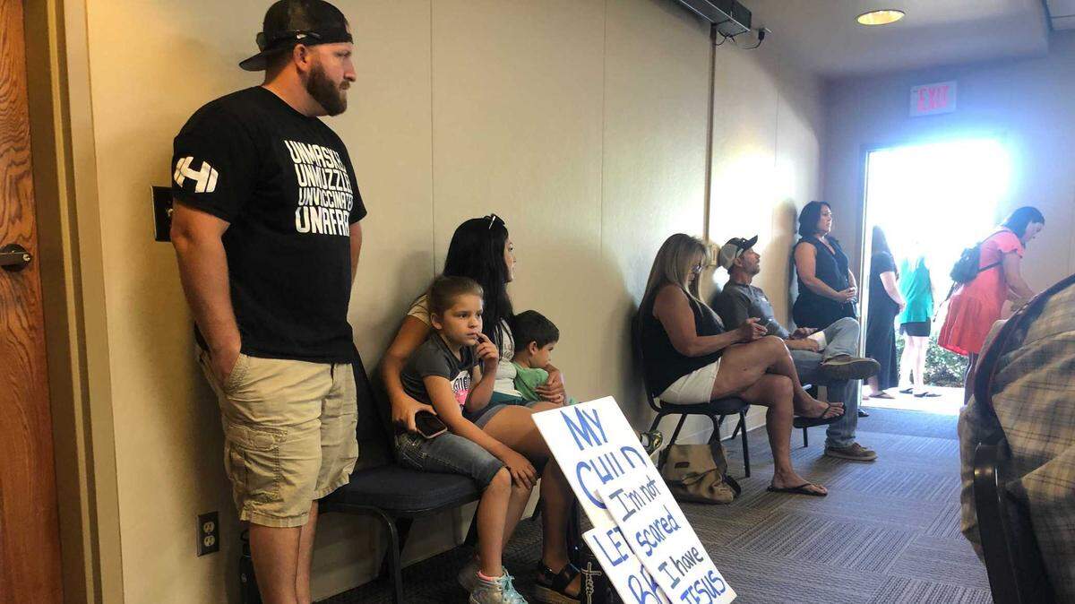 Parents from Moms for Liberty attended the Atascadero school board meeting on Thursday to ask the district not to enforce California’s mask mandate.