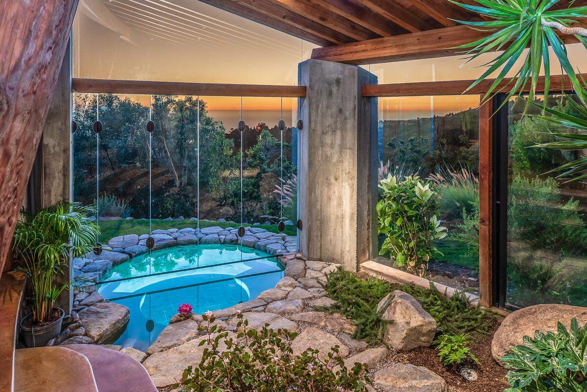 An inside-outside hot tub is among the special features of this Big Sur home, on the real estate market for $4.9 million.