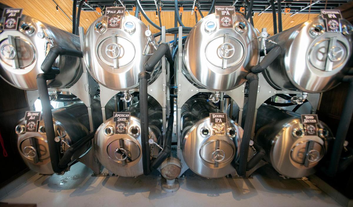 The beer is stored in stainless steel tanks behind the bar area at Paso Robles Brewing Company.