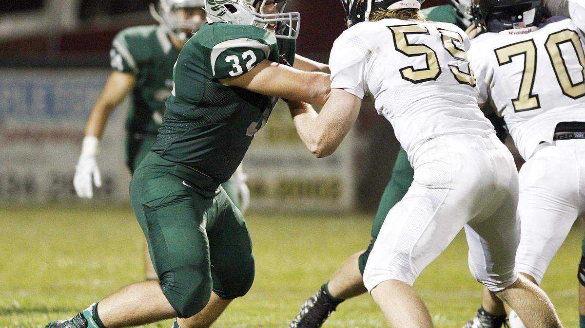 Templeton High School's Isaac Lindsey runs a play against San Luis Obispo High School during the Sept. 18, 2015, football game during which he was seriously injured.