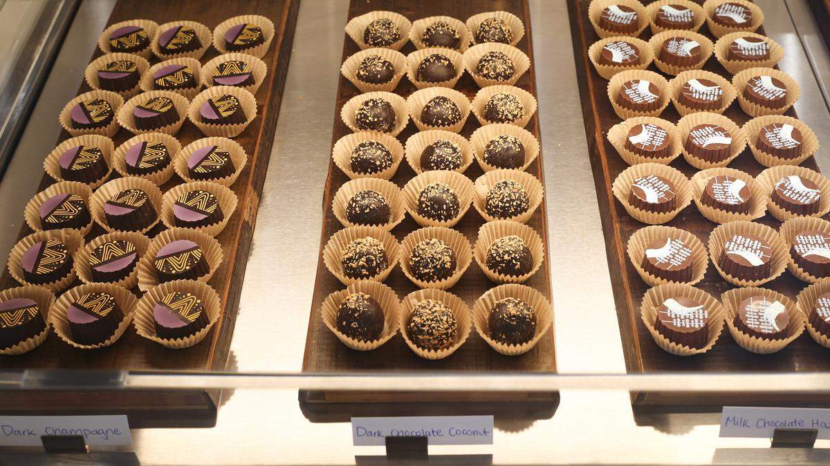 From the left, at the entry to the shop are Dark Champagne chocolate, Dark Chocolate Coconut and Milk Chocolate Hazlenut. Tifa Choclate & Gelato is open on Chorro St. in San Luis Obispo seen here on Feb. 20, 2026.