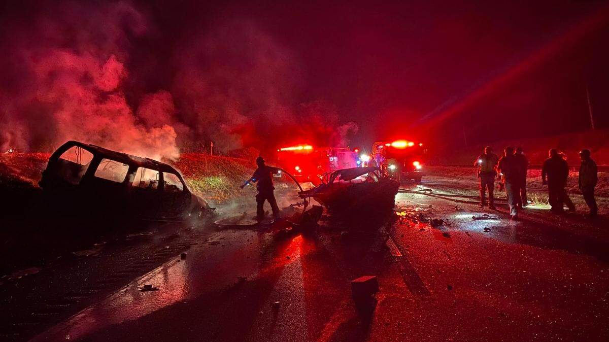Santa Barbara County Fire Department crews extinguish vehicle fires after a crash on Highway 101 early Wednesday morning. Two fatal crashes were reported around the same time, according to the CHP.