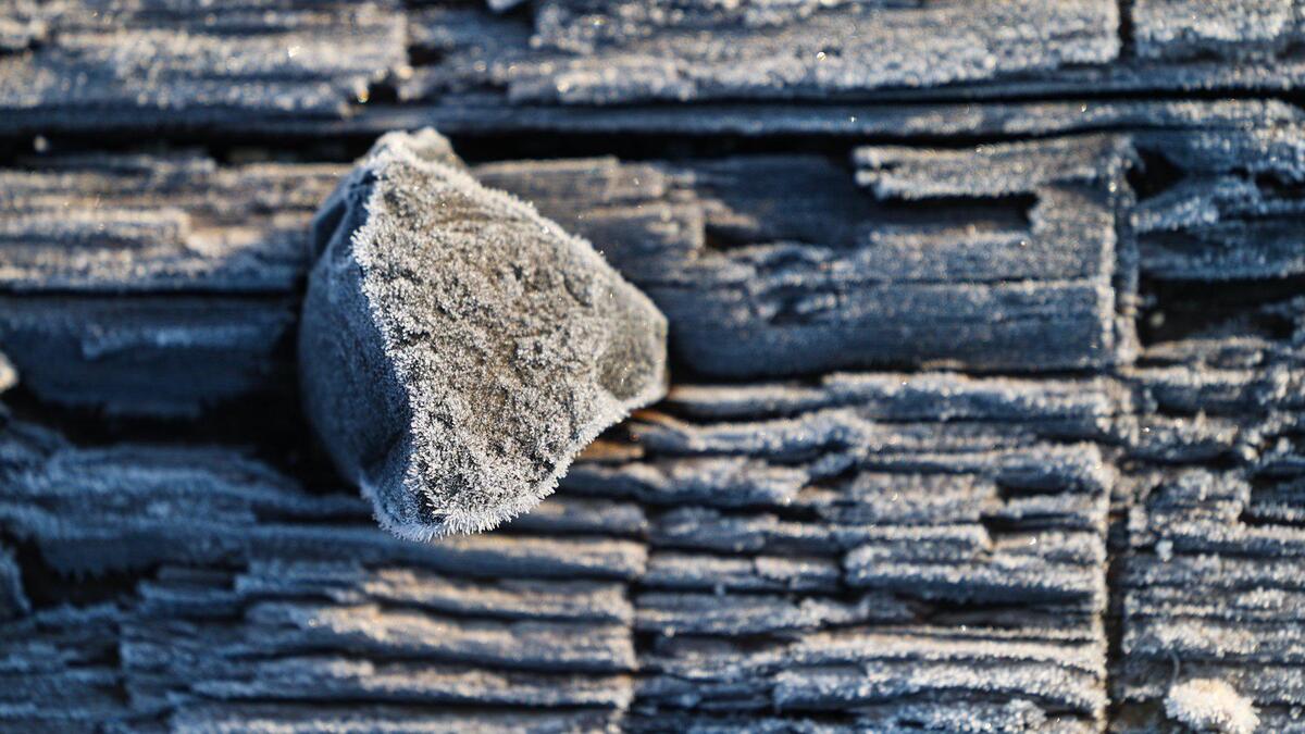 Frost crystals cover a Union Pacific railroad tie and a rock as temperatures dipped below freezing in Santa Margarita on the morning of Feb. 15, 2023.