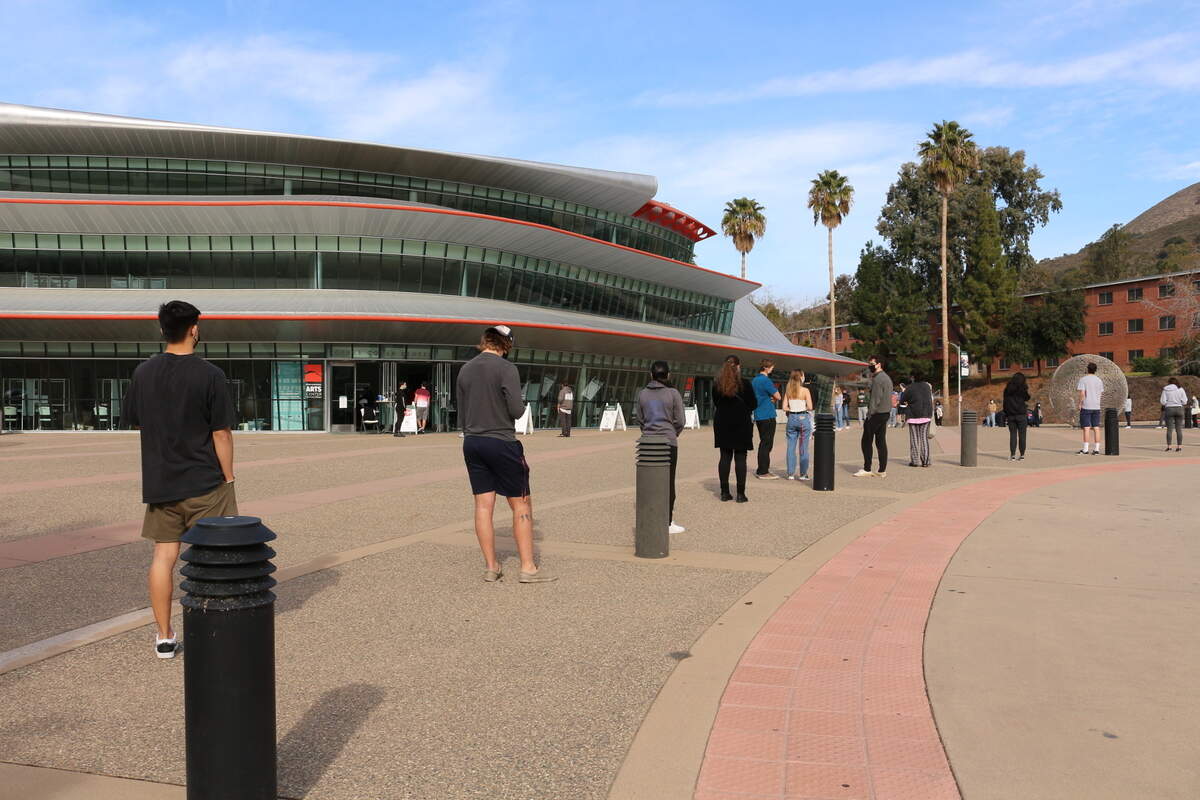 Hundreds of students line up outside Cal Poly’s Performing Arts Center to get a test for COVID-19 on Jan. 3, 2021.