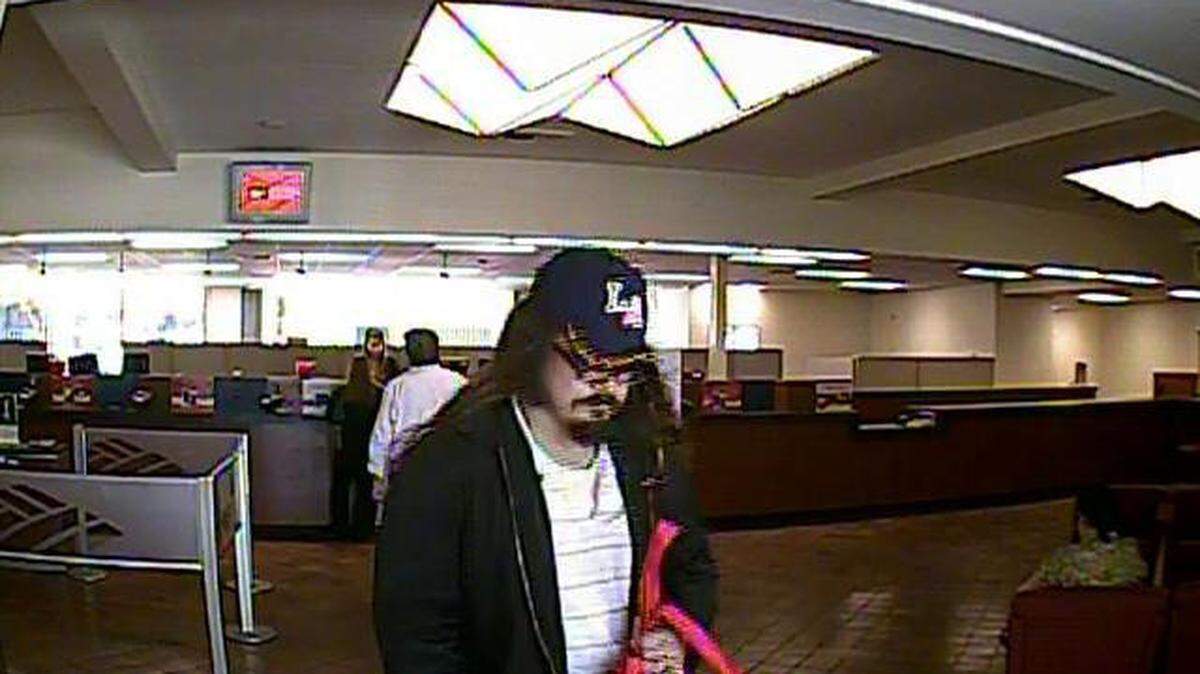 An image taken from surveillance video shows a man who robbed the Bank of America branch in downtown San Luis Obispo on Wednesday, July 24, 2013, according to San Luis Obispo police.