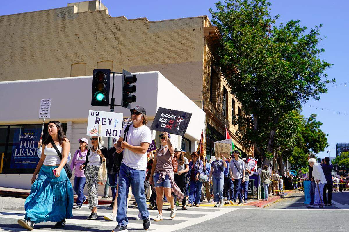Protesters take to the streets during the No Kings protest in San Luis Obispo on Saturday, March 28, 2026. Organizers estimated around 2,500 people attended the San Luis Obispo protest, with more in Atascadero, Cambria and Grover Beach.