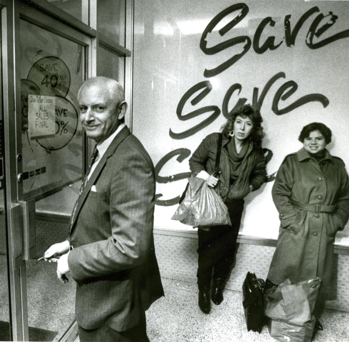 J.C. Penney Manager Gary Perkins locks the door as employees Just Granvold, center, and Mary Prats leave when the store closed after 61 years in downtown San Luis Obispo on Dec. 24, 1990.
