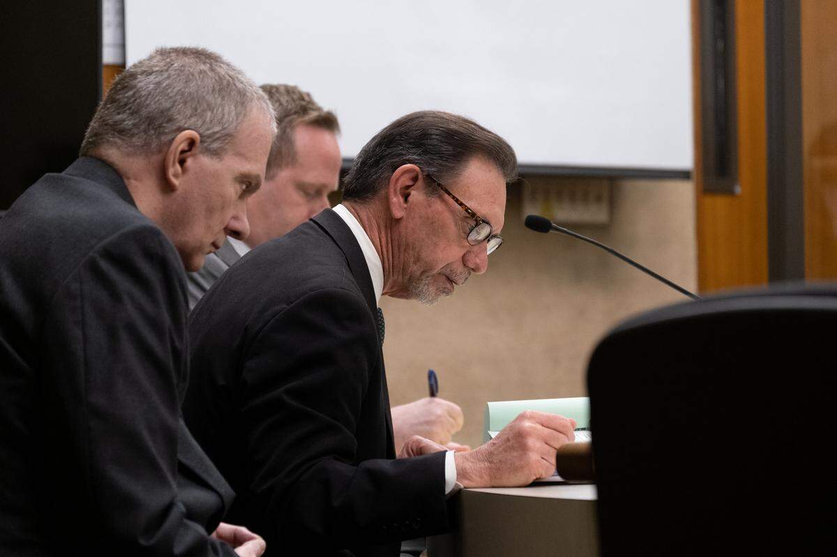 Defense Attorney Ray Allen (center) looks at his notes during the trial against Stephen Deflaun in San Luis Obispo Superior Court on March 27, 2023.