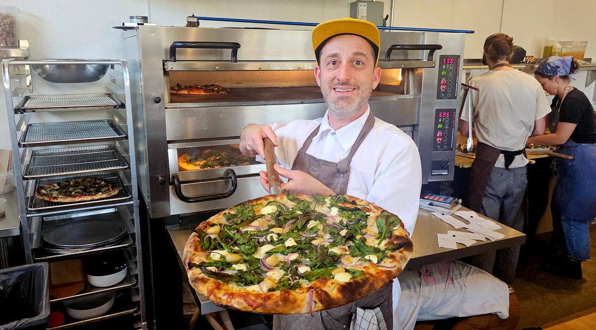 Mike Radakovich, owner of My Friend Mike’s pizzeria in San Luis Obispo, sells pies made with sourdough crust and ingredients from local farms.