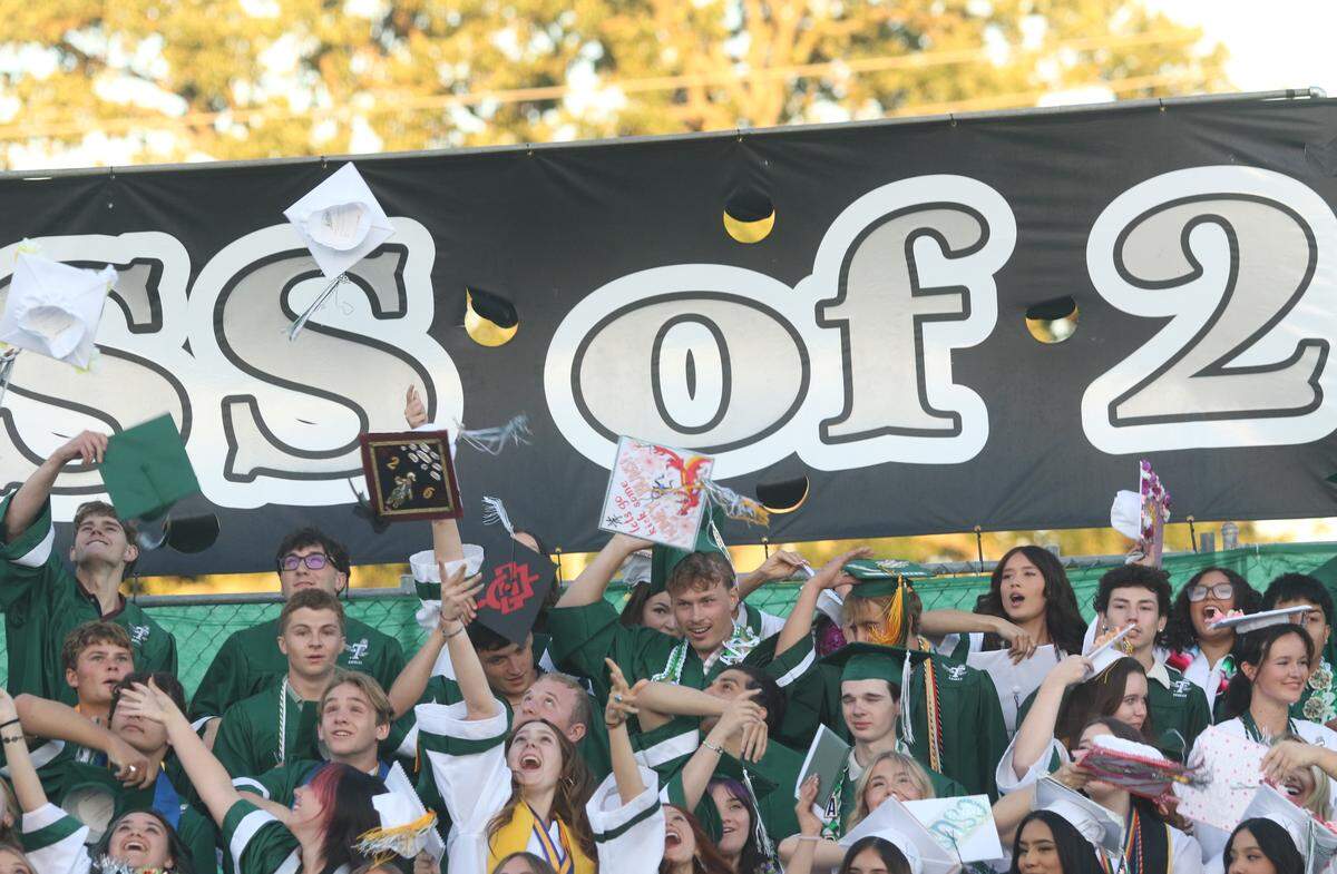Templeton High School graduates toss their caps in the air at their commencement ceremony on June 4, 2026, where 186 students received their diplomas.
