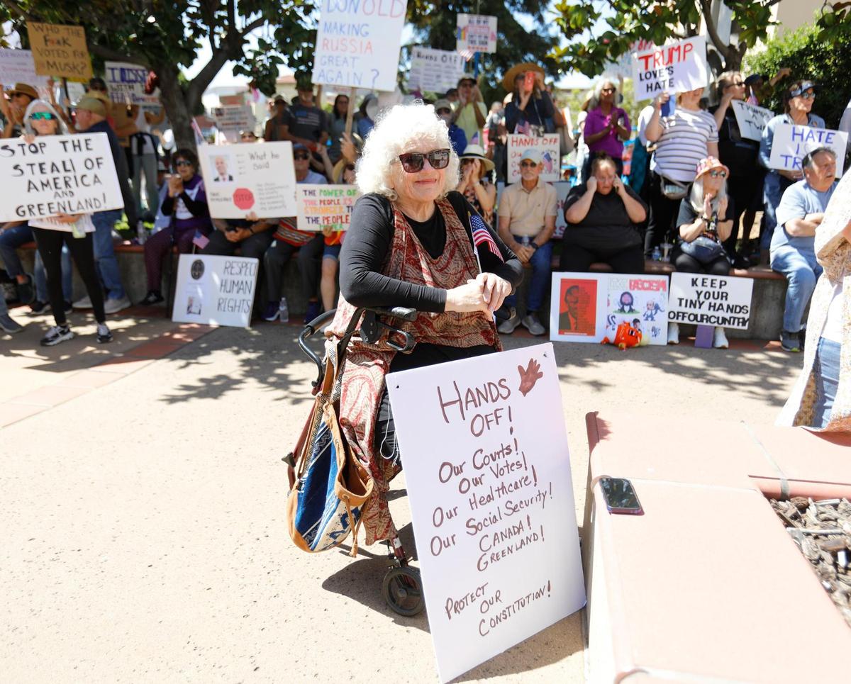 Thousands of people gather at San Luis Obispo Superior Court in California as part of the “Hands Off!” rally to protest President Donald Trump and his advisor Elon Musk.