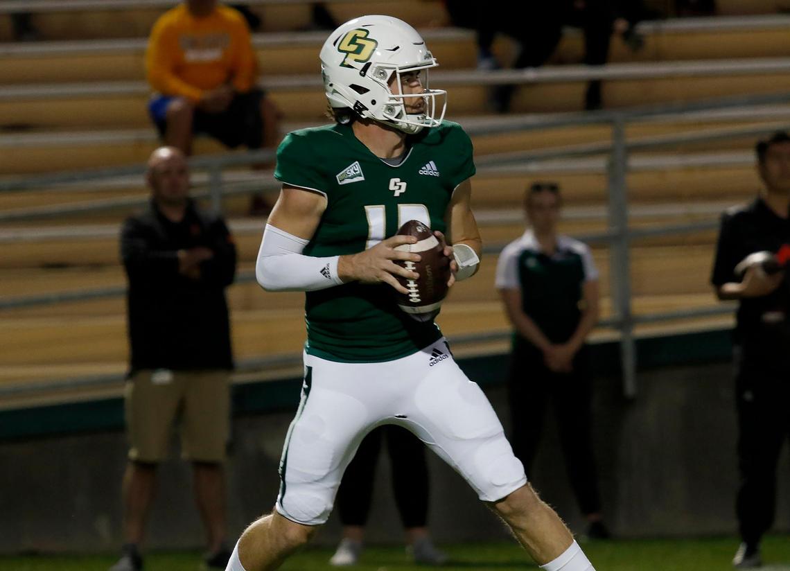 Cal Poly quarterback Spencer Brasch looks for a receiver in the Mustangs’ 32-29 win over Idaho State at Alex G. Spanos Stadium on Nov. 13, 2021.