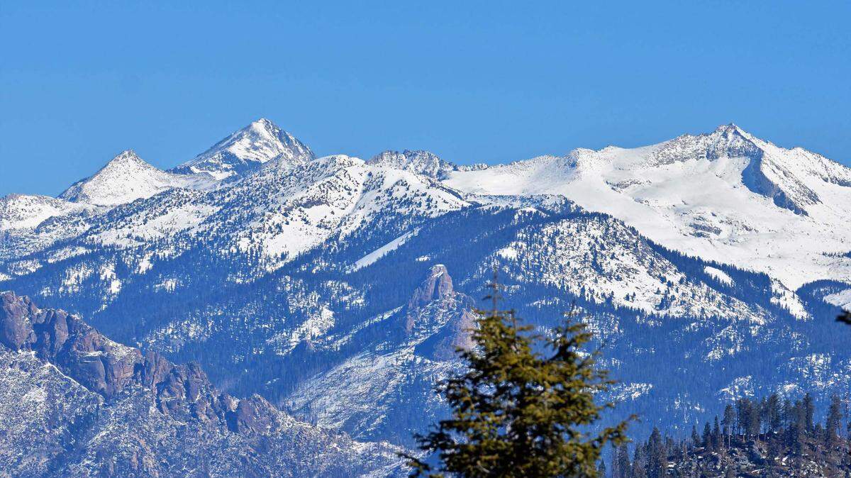 Snow tops the peaks at Sequoia National Park.